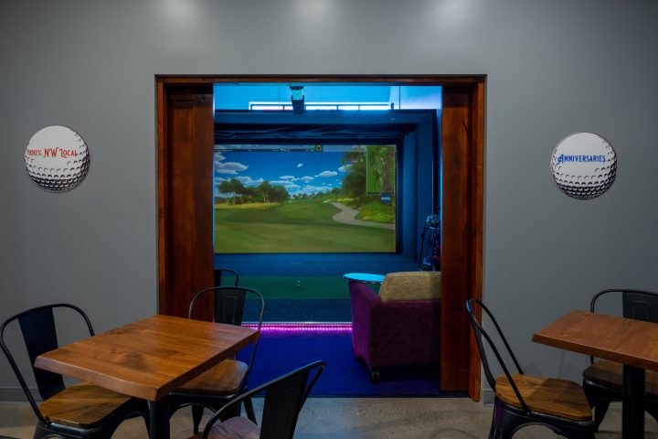a desk with a chair in a room