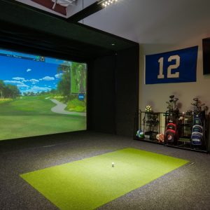 A shot of a golf simulator screen on a golf course.