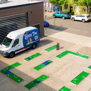 a close up of a toy car in a parking lot